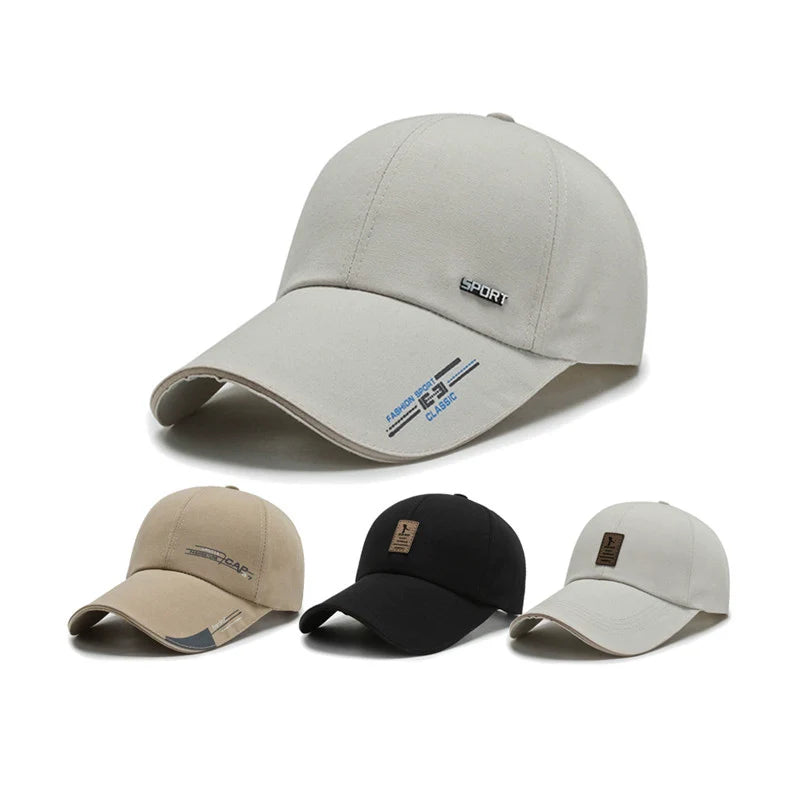 set of four casual baseball caps in beige, black, and off-white, with embroidered sport logos