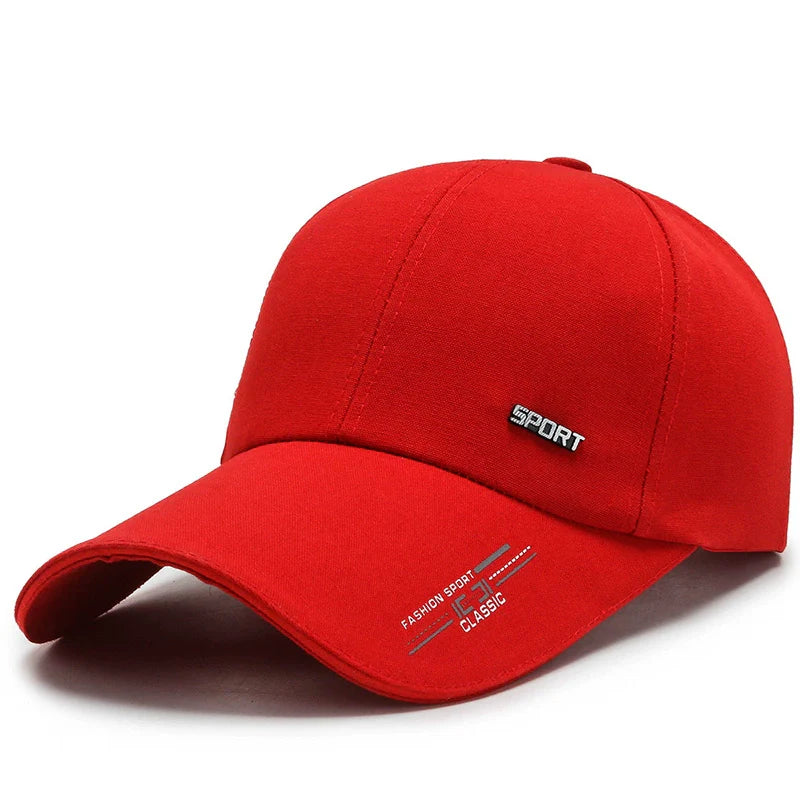 Red sport baseball cap with embroidered text and curved brim on white background