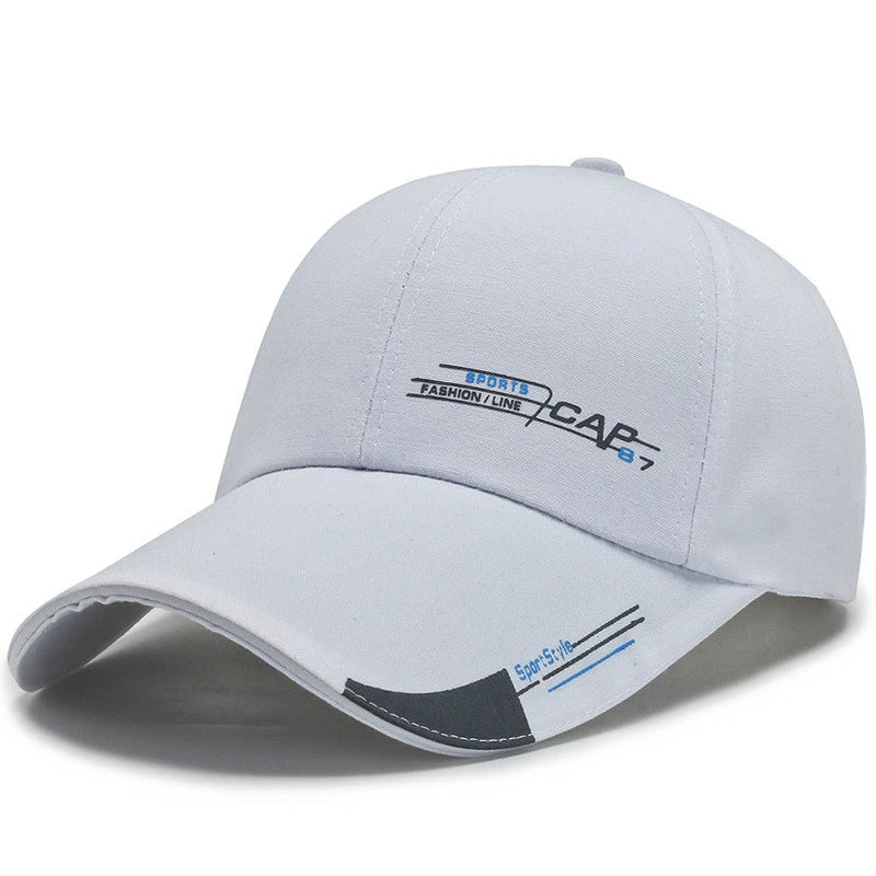 White sports baseball cap with blue and black graphic print, curved brim, casual style