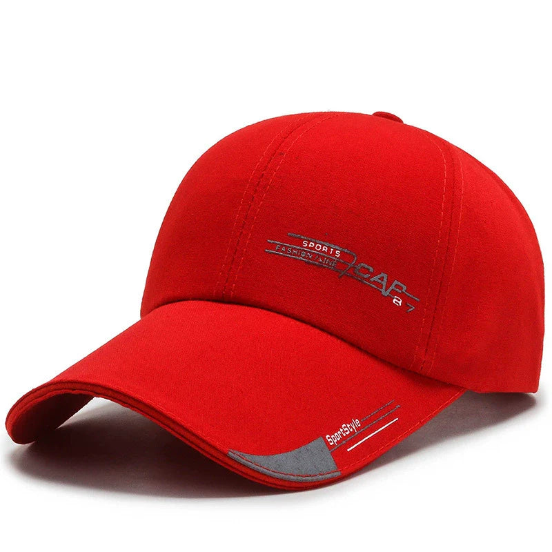 Red sports baseball cap with gray embroidered text and curved brim