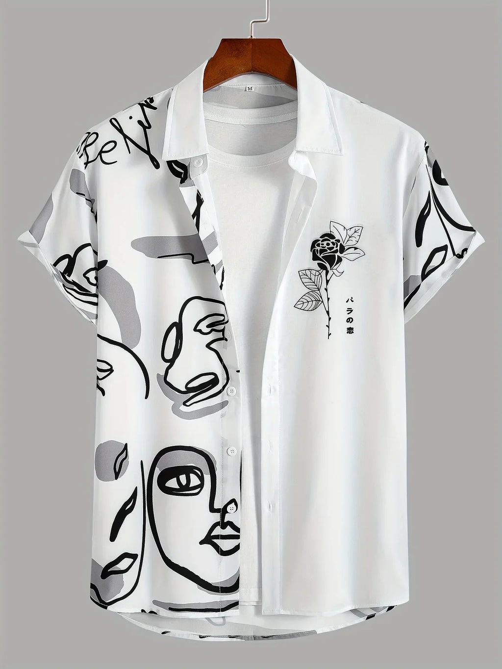 White short sleeve button-up shirt with abstract face print and rose graphic, modern casual style