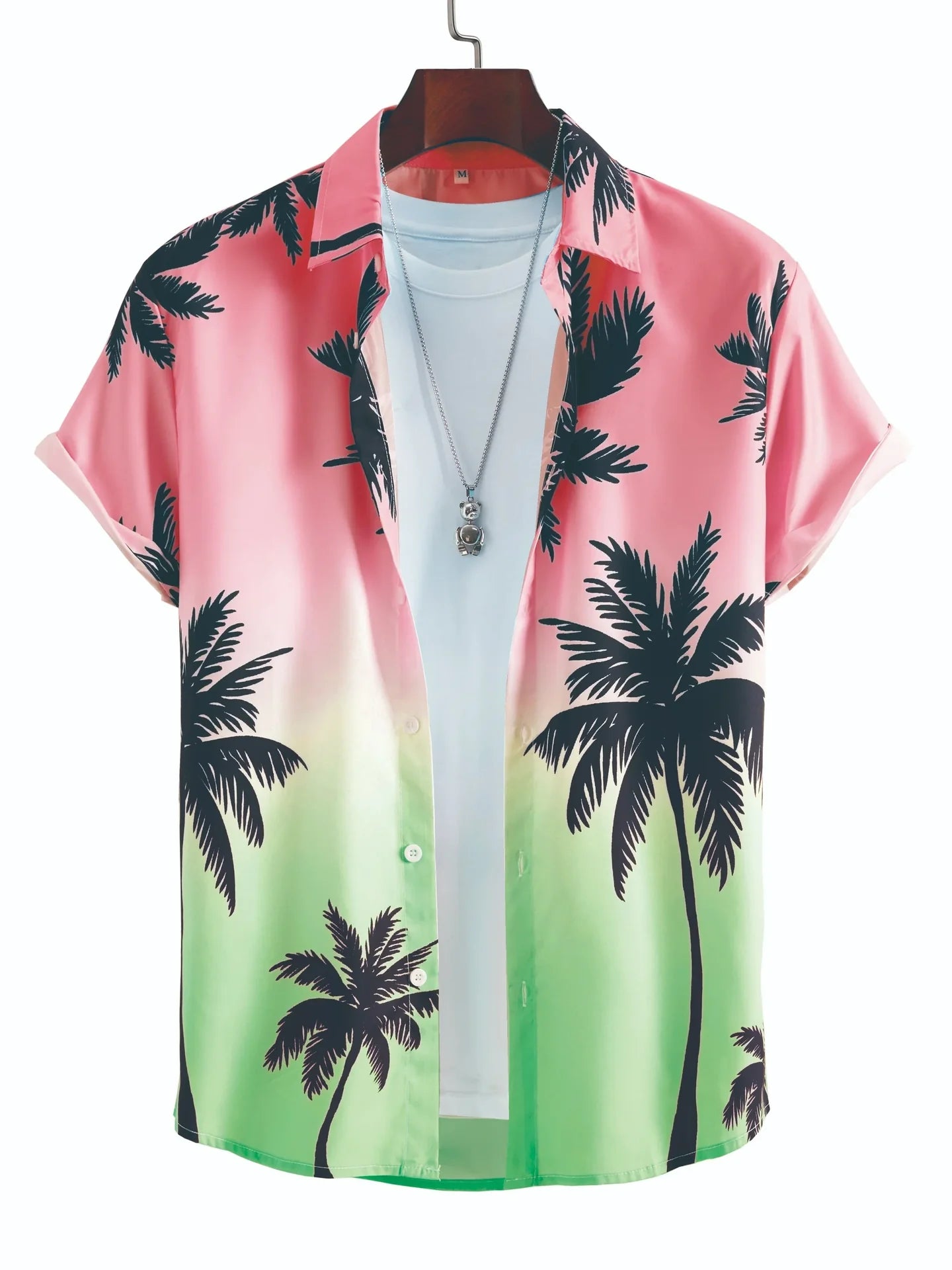 Pink and green ombre short sleeve shirt with black palm tree print, layered over white tee