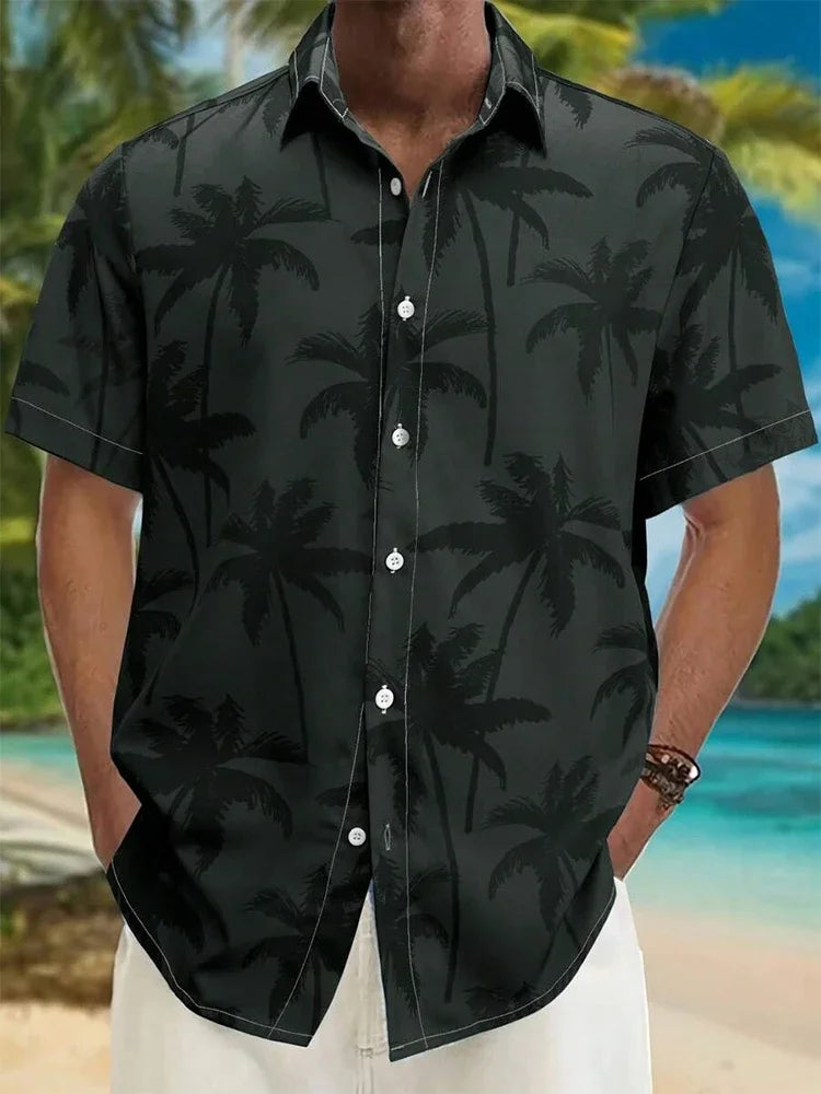 Men's short sleeve button-up shirt with black palm tree print, beach background