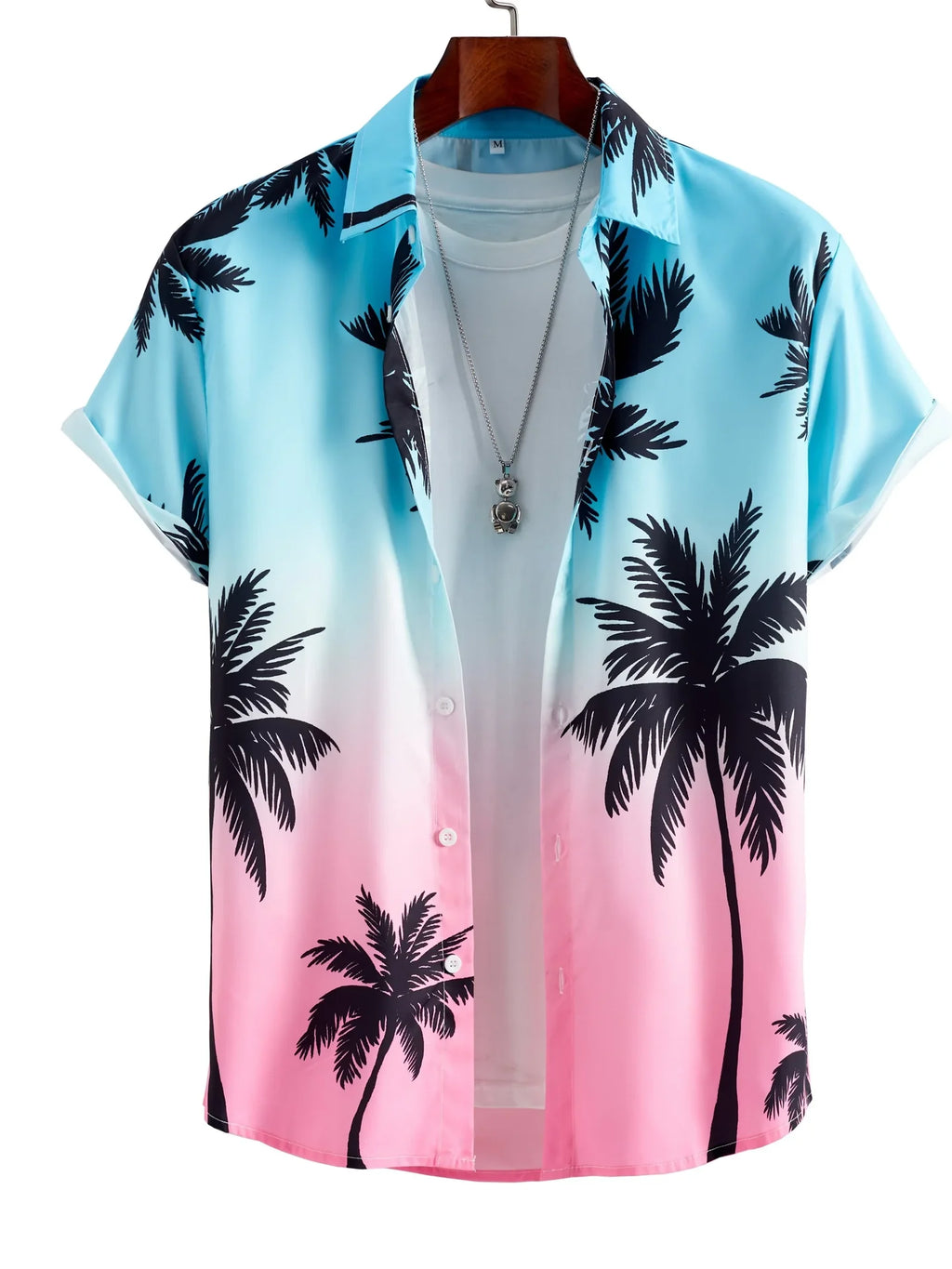 Gradient pink and blue short sleeve shirt with black palm tree print on hanger